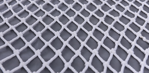 Tightly woven safety netting for roofs